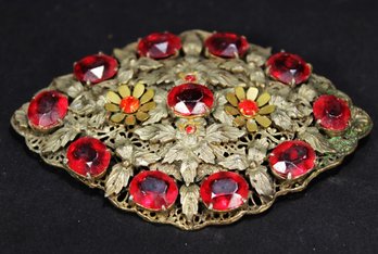 LARGE ART DECO 1920S RED GLASS SASH PIN WITH FLOWERS