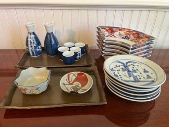 A Ceramic Asian Offering Saki Set And Various Dishes