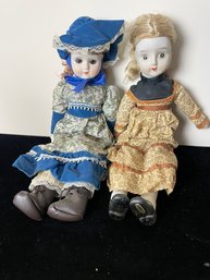 Pair Of Porcelain Dolls