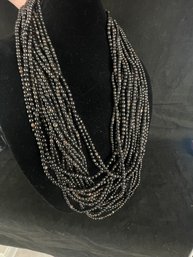 Multitude Of Black Beads On A Single Necklace 1 Of 2