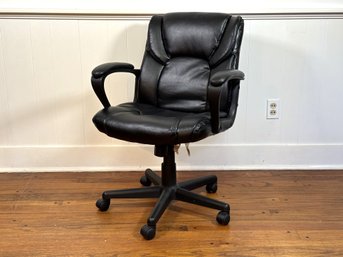 An Adjustable Office Chair With Arms