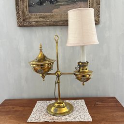 An Antique Converted Brass Oil Lamp With A Silk Shade