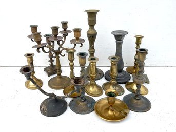 A Large Antique Brass And Metal Candlestick Assortment
