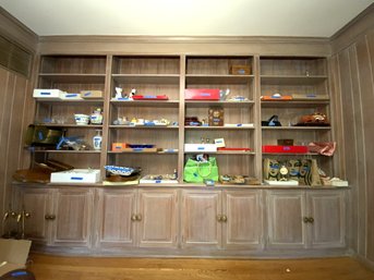 Custom Wood Built In Shelves With Lower Cabinets And Crown Molding Arpund Room