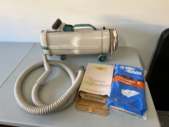 Vintage Electrolux Vacuum Cleaner With Miscellaneous Vacuum Bags