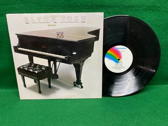 Elton John. Here And There. Live In New York On 1976 MCA Records.