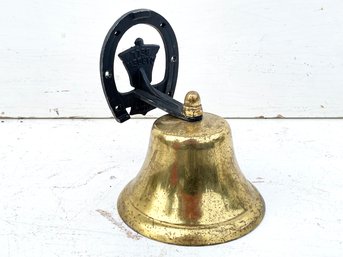 An Antique Brass Equestrian Themed Bell
