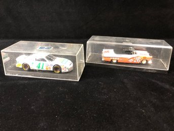 Pair Of Race Car Toy Models In Display Boxes