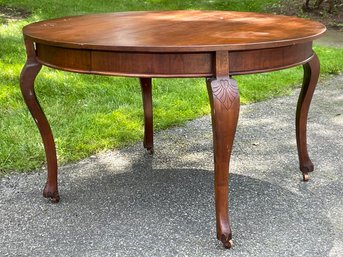 An Antique Mahogany Dining Table