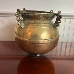 An Antique Brass Heavy 4 Handle Vessel