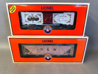 NIB Lionel Trains: Christmas Music Box Car & N & W Quad Hopper, 6-26818 & 6-19357