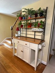 A Beautiful Sideboard With Scrolled Metal Hutch Top