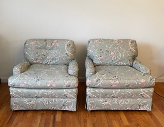 A Pair Of Upholstered Club Chairs, Having Floral Style Upholstery Rolled Arms