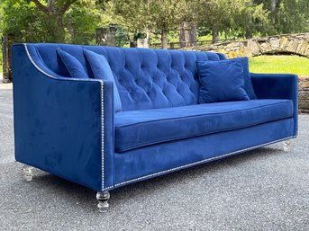 A Glam Tufted Microfiber Sofa With Nailhead Trim And Lovely Lucite Legs By Safavieh