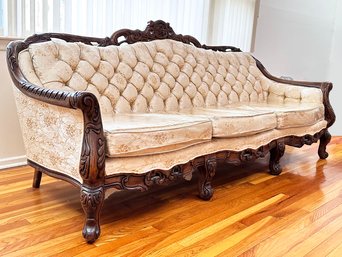 A Vintage Sofa In Mahogany And Tufted Silk