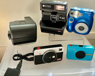 Lot Of 5 Cameras: 1 Kodak C210R W/ Charger- 3 Polaroid- Snap, 300 &  2  Polaroid 600 All  Untested