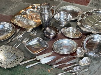 A Large Assortment Of Silver Plated Serving Ware