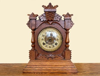 A Victorian Oak Eastlakel Clock By The Ansonia Clock Company