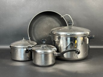 An Assortment Of Farberware Pots & Pans