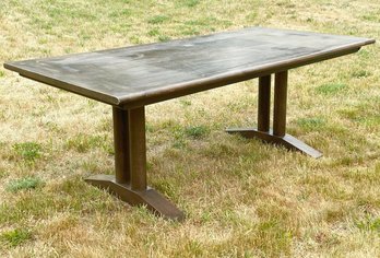 A Large Extendable Farmhouse Table With Trestle Base In Burnt Oak Finish By Ethan Allen