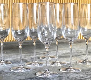 A Set Of 8 Fine Champagne Flutes