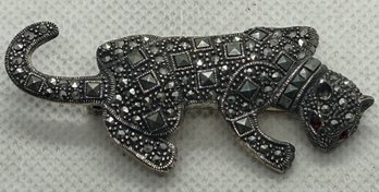 Vintage Sterling Silver And Marcasite Panther Brooch With Garnet Eyes