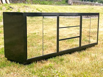 A Vintage Modern Mirror Paneled Credenza In Black Lacquer