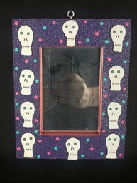 Purple, Hand-painted Frame Around The Mirror Features Skeletons