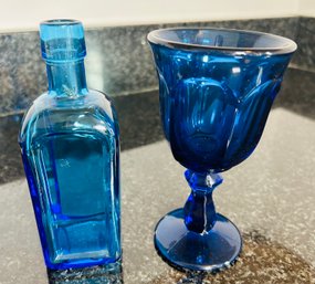 Blue Glass Bottle And Wine Glass