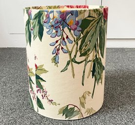 A Fabric Covered Wastebasket