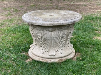 A Cement-Look Column Table With Umbrella Hole In Cast Plastic