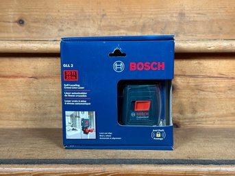 A Self-Leveling Cross-Line Laser By Bosch In Original Box