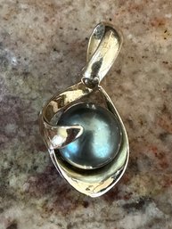 Beautiful Black Pearl Wrapped With 14k Gold Pendant
