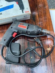 An Electric 3/8' Drill - By Skil