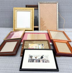 An Assortment Of Small And Medium Photo Frames