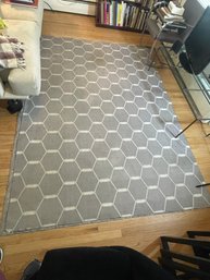 A MCM WOOL FLATWEAVE GEOMETRIC AREA RUG