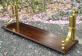 An Elegant Brass And Cherry Wood Shelf