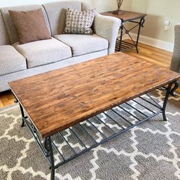 Rustic Wood And Wrought Iron Coffee Table With Knot Detail