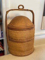 A CHINESE STYLE TWO TIER LUNCH OR SEWING BASKET