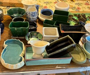 TABLE LOT OF POTTERY PLANTERS AND VASES