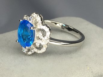 Wonderful 925 / Sterling Silver Ring With London Blue Topaz - Surrounded With Sparkling White Sapphires