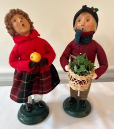 The Carolers - Boy With Holiday Greens And Girl With Orange