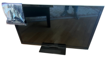 Large Panasonic 42' Flat Screen Television With Table Top Stand / Remote