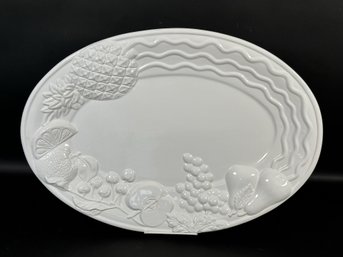 A Contemporary Ceramic Platter, Fruit-Embossed Rim