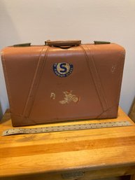 Vintage Brown Leather Suitcase With Some Old Travel Stickers