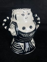 Pottery Decorated With Black And White Abstract Image