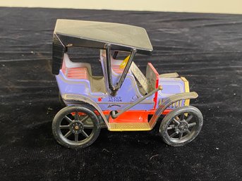 Vintage Modern Trade Mark, Lever Action Tin Toy Car