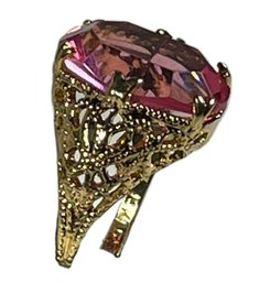 Very Pretty Gold Plated Filigree Ring With Large Pink Stone About Size 7