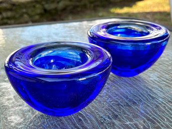 A Pair Of Kosta Boda Crystal Votive Holders