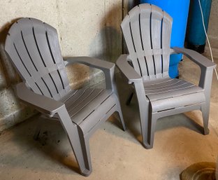 Two Plastic Adirondack Chairs